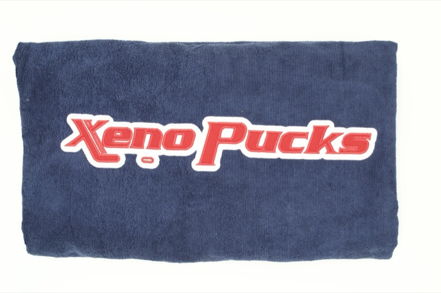 Navy Xeno Pucks embroidered gym towel with red and white lettering