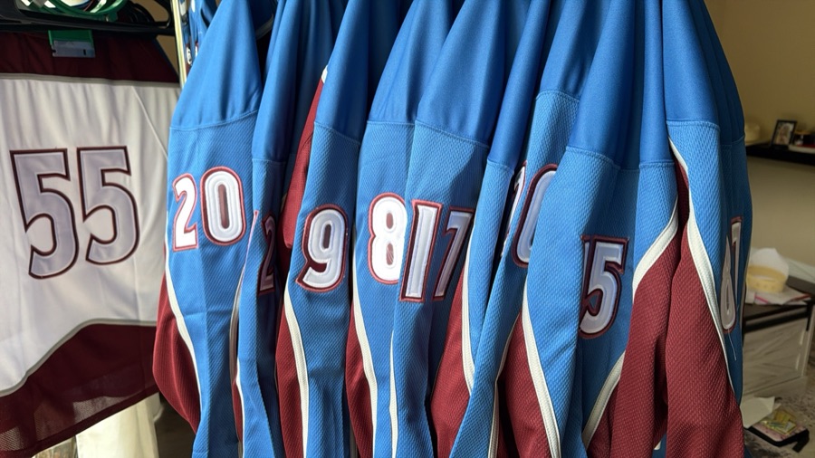 Custom hockey jerseys with twill numbers and lettering in blue and burgundy colorway