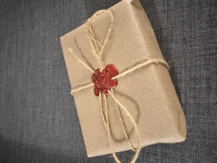 Wax-sealed kraft paper package with twine — Daddy's Hands signature unboxing experience